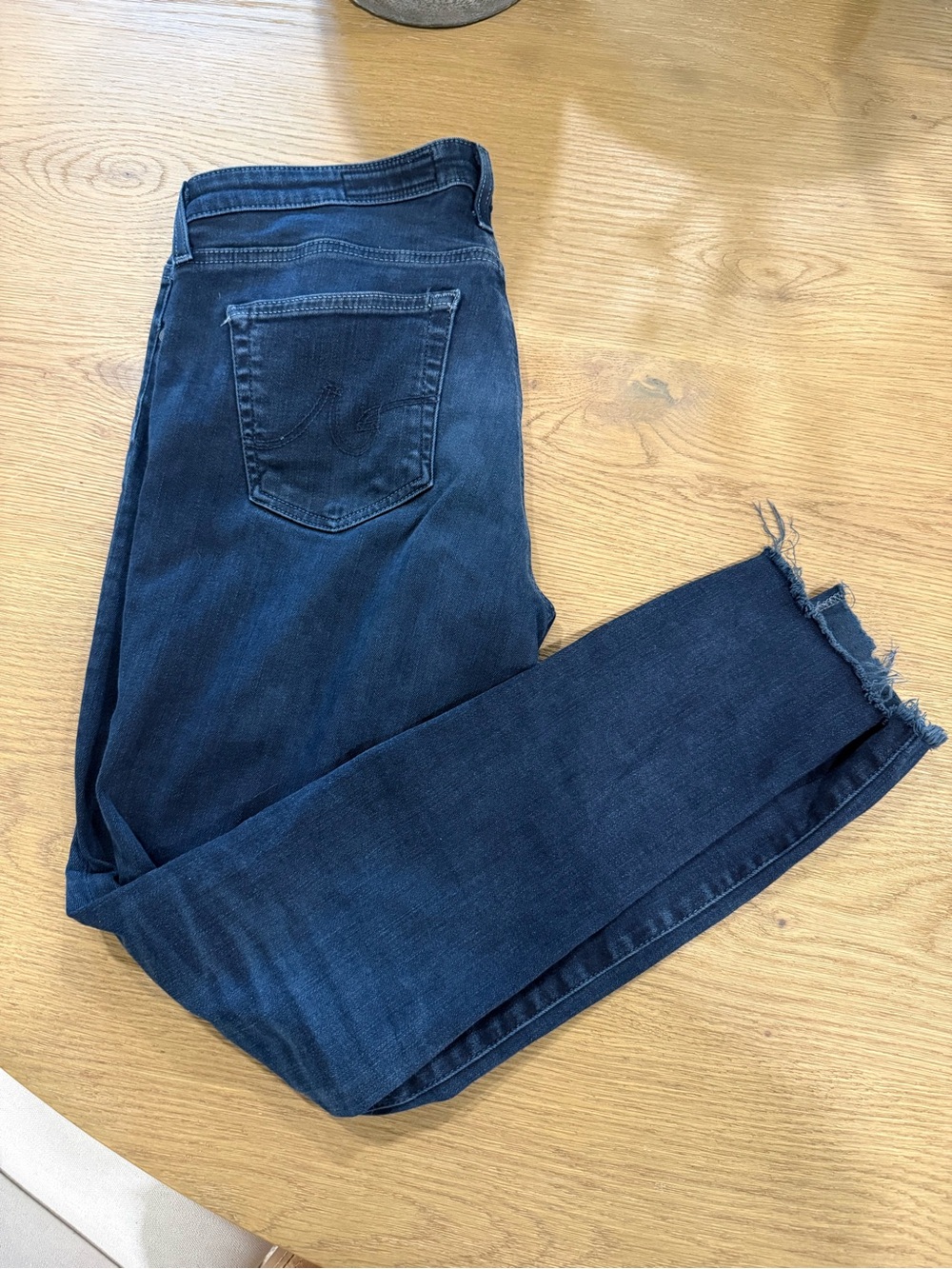 AG Adriano Goldschmied Dark Indigo Skinny Jeans with Frayed Hem
